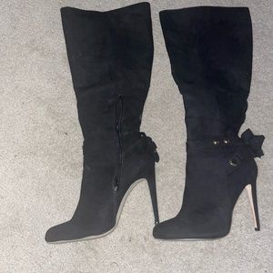 Shoe Dazzle black stiletto boots. 4.25 heel height